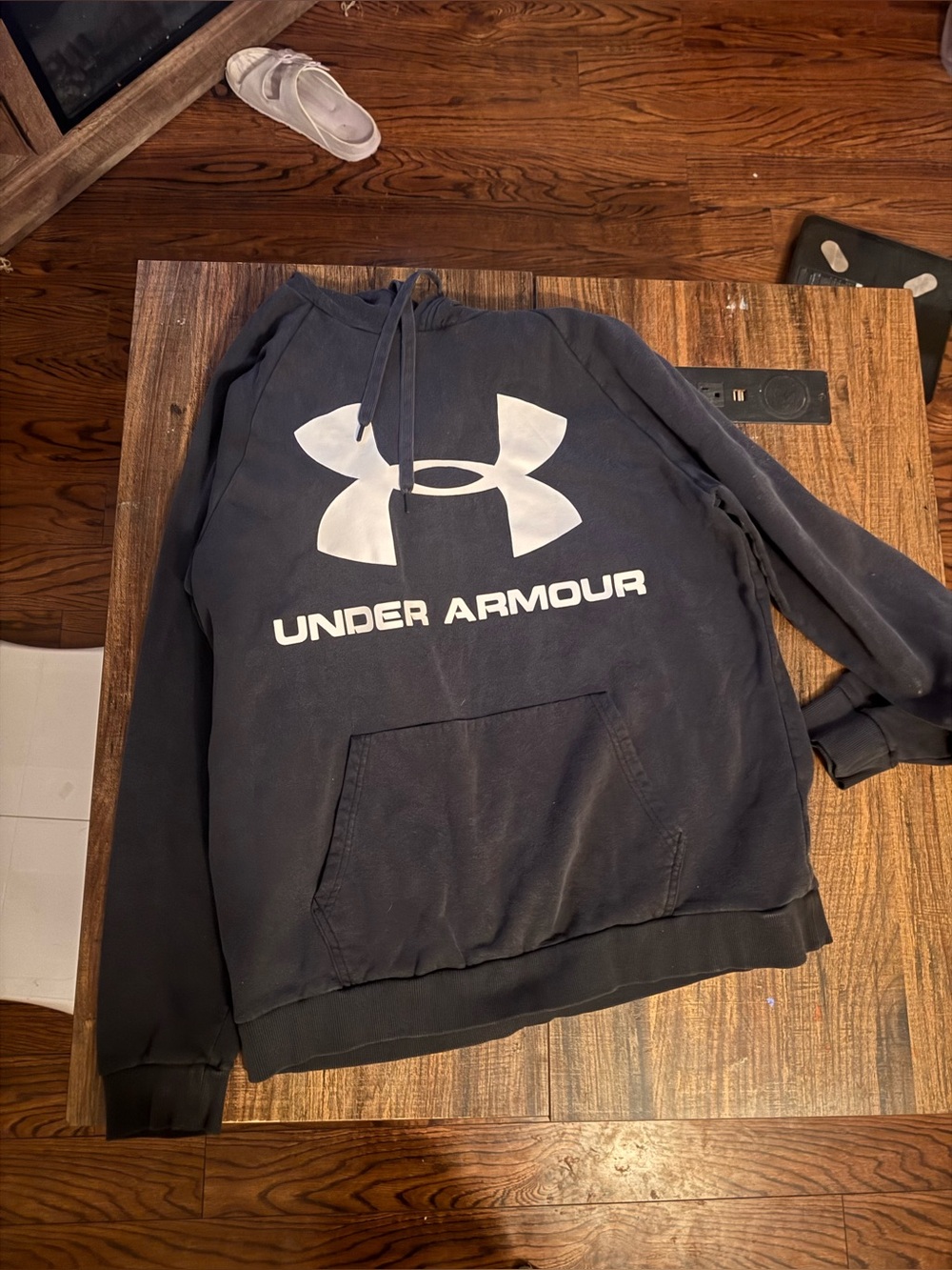 Under Armour woman’s or Men’s black sweatshirt with White Logo